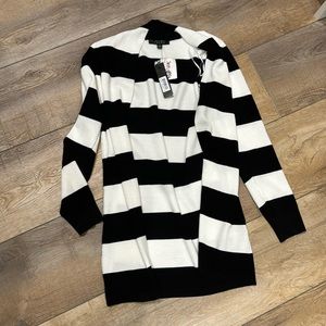 Long sleeve open front long fitted sweater.